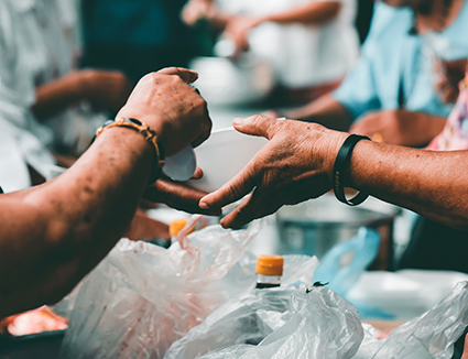 Workers Distributing Humanitarian Aid Food and Water